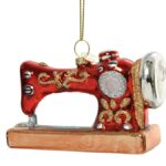 زينة زجاجية على شكل ماكينة خياطة