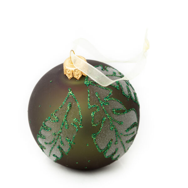 كرة زجاجية خضراء برسم أوراق